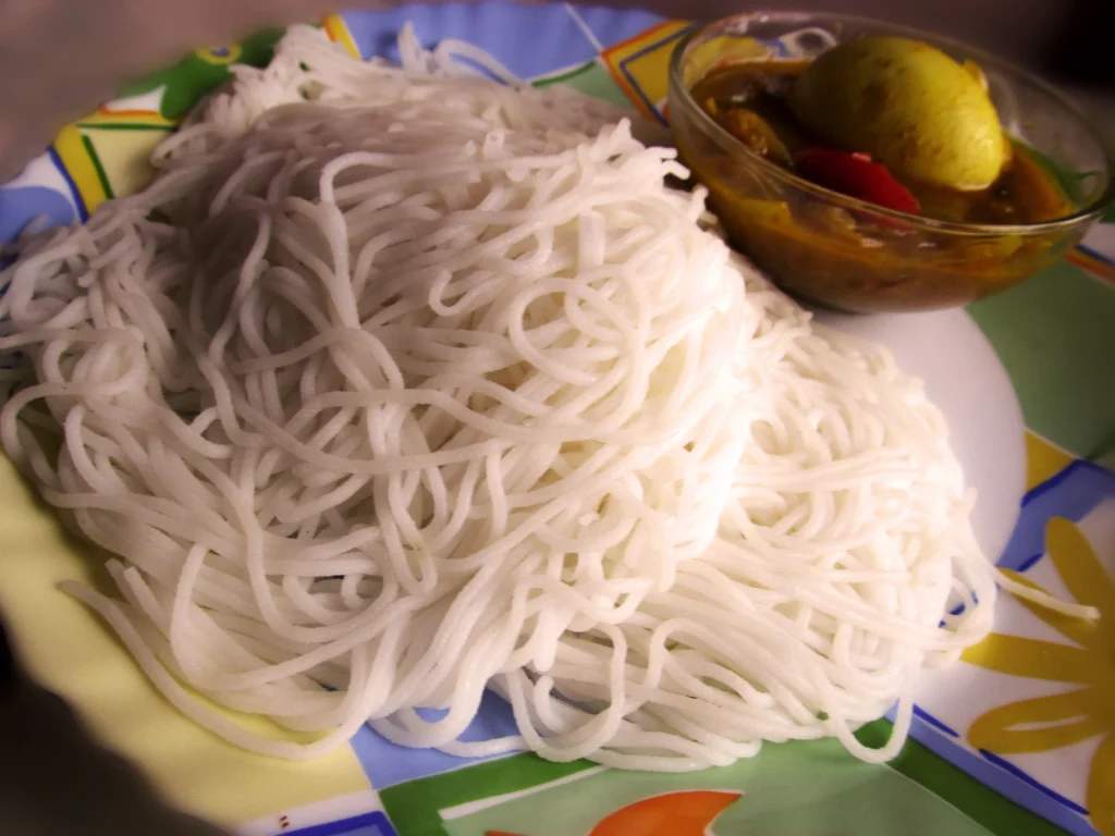 Idiyappam served with egg masala curry