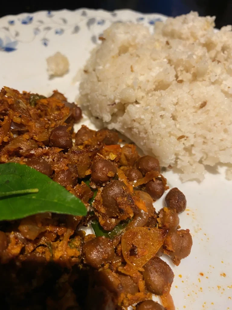 Kerala puttu served with spicy kadala curry