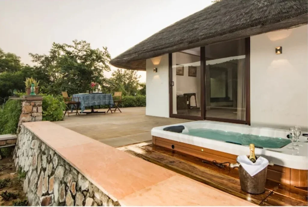 Guests enjoy a peaceful stay at the best luxury wildlife resorts in India.