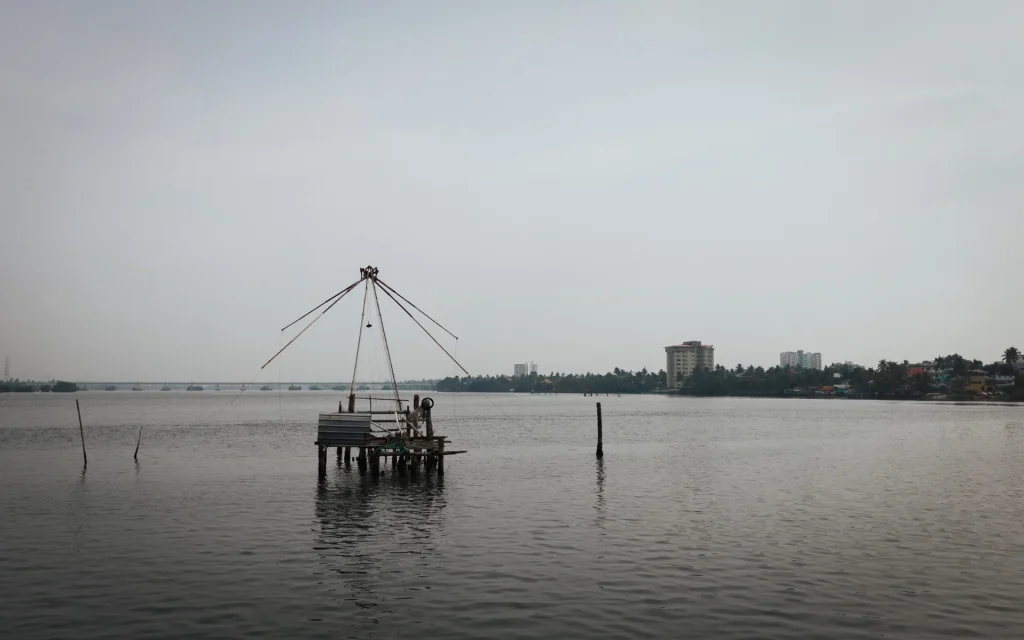 Couples enjoying cool breeze during best time to visit Kochi Kerala in winter.