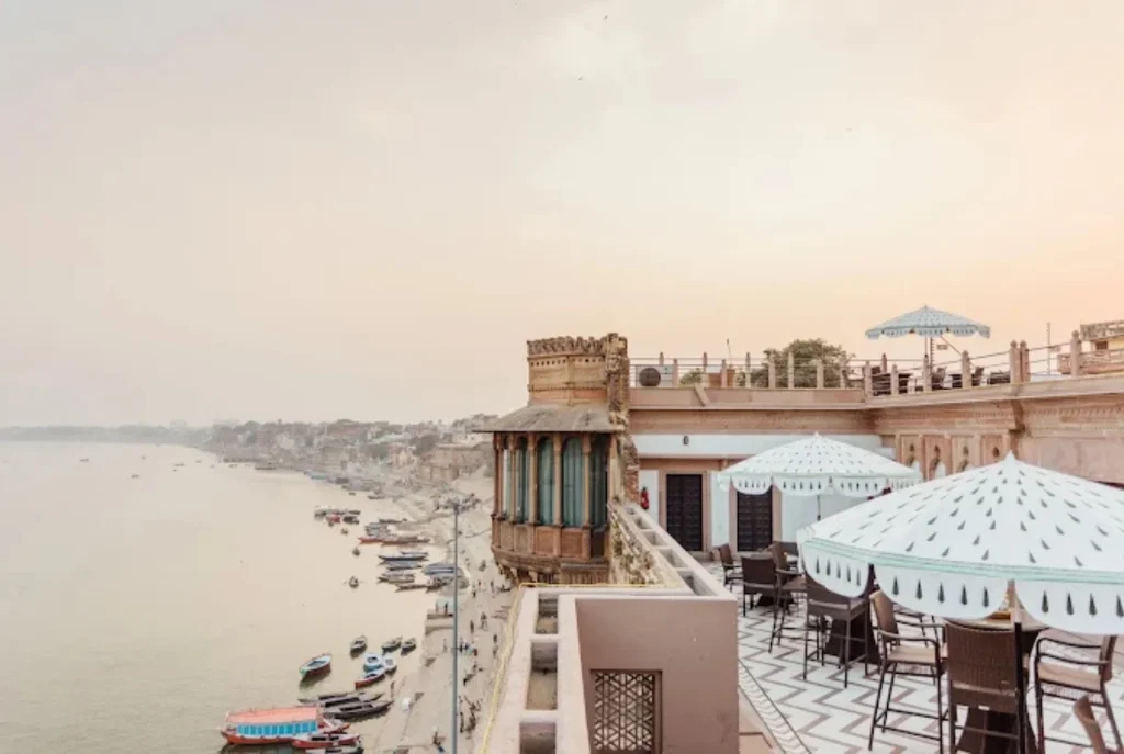 Guests enjoying riverside stay at a luxury resort in India.