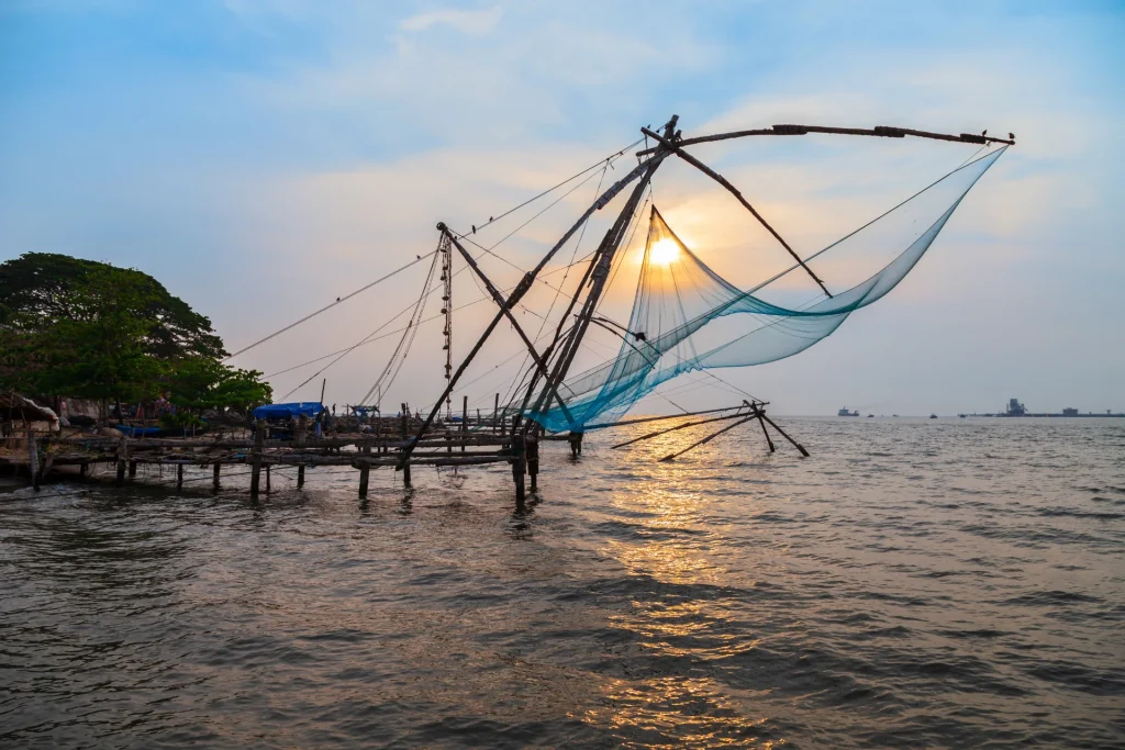 Family enjoying calm moments at places to visit in Cochin with family.
