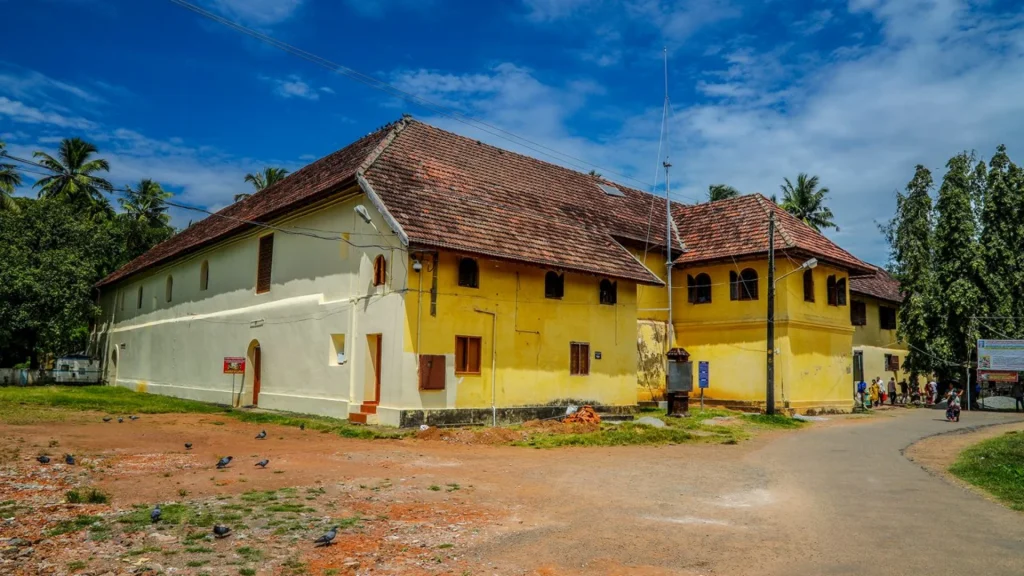Family admiring places to visit in Kochi with family at Mattancherry Palace.